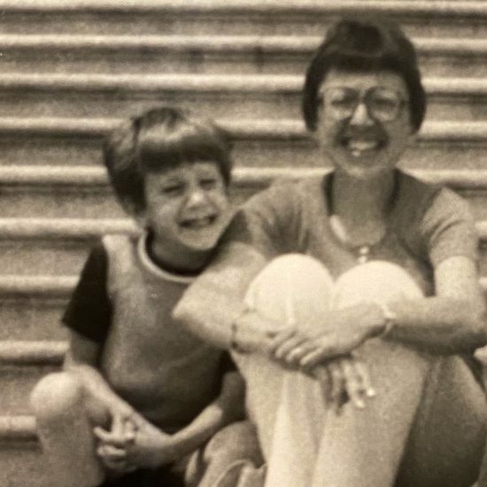 young john and mother on steps